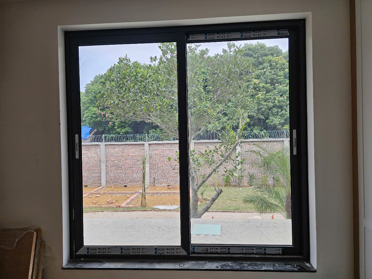 Cửa sổ lùa 2  cánh và 3 cánh hệ châu âu Aluso