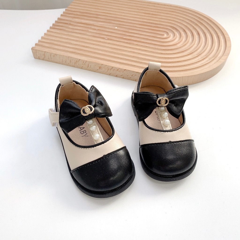 MT Giày búp bê mũi đen phối nơ đính ngọc