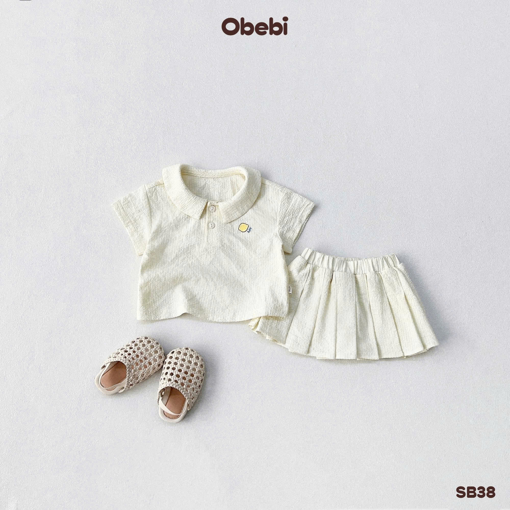 OBEBI - Bộ sơ mi cộc tay chân váy xếp ly OBEBI (73-120)