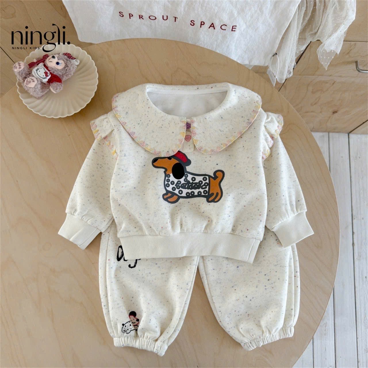 BK - Bộ nỉ kem cổ sen in cún (90-140)