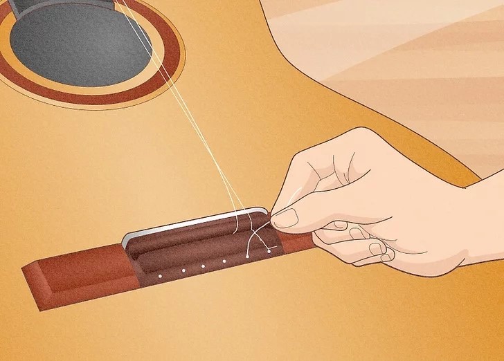 CÁCH THAY DÂY ĐÀN GUITAR CLASSIC 2 2 jpeg