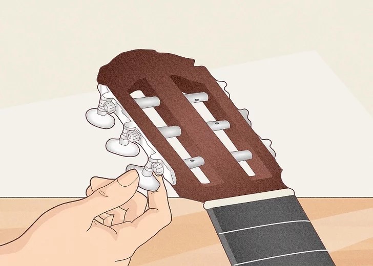 CÁCH THAY DÂY ĐÀN GUITAR CLASSIC 9 a jpeg