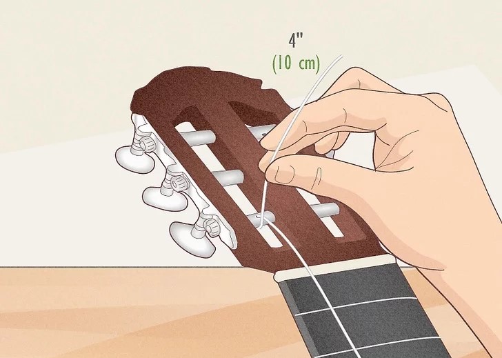 CÁCH THAY DÂY ĐÀN GUITAR CLASSIC 12 d jpeg