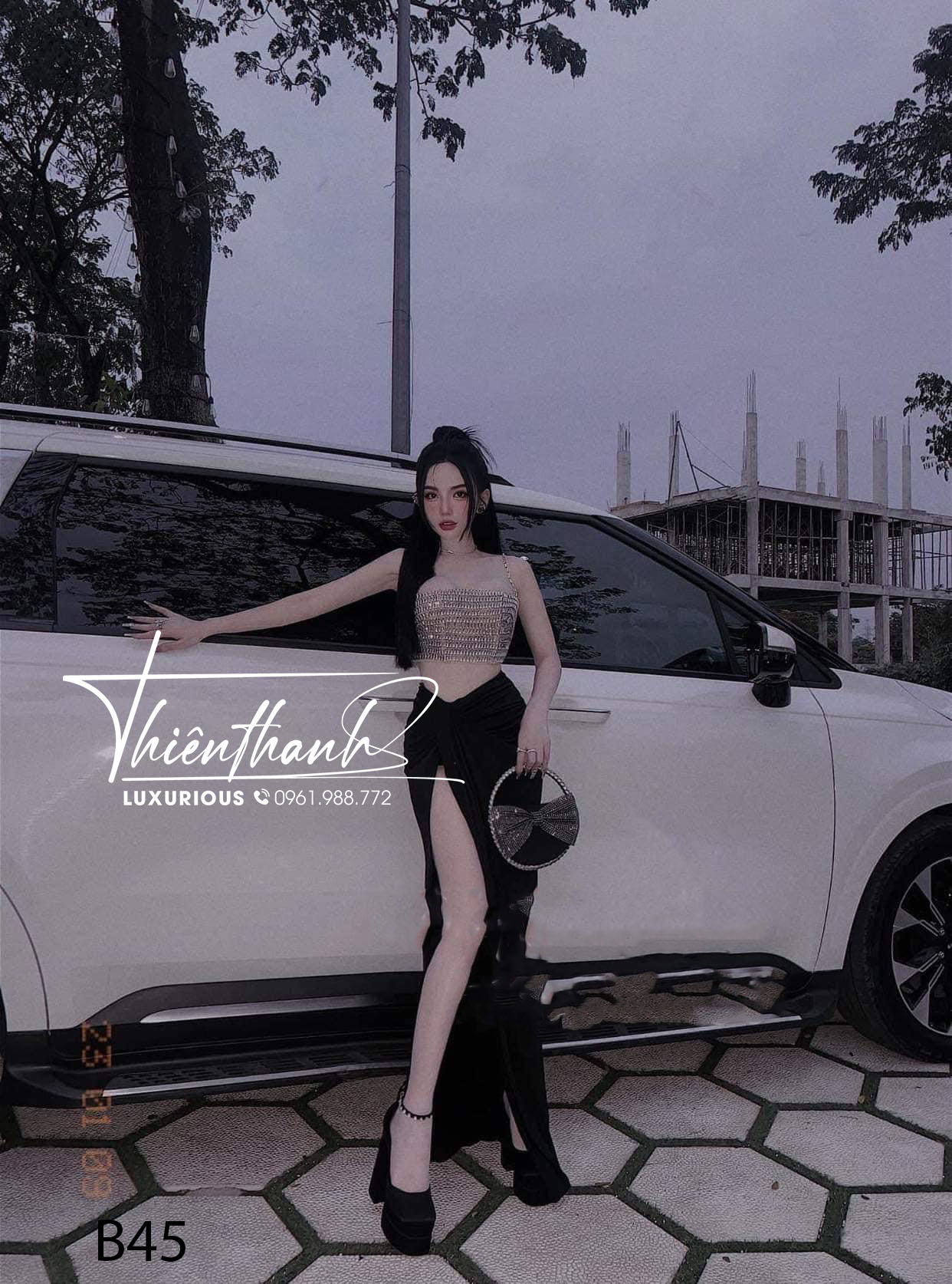 Đầm TK Dài Hai Dây Khoét Bụng Đính Đá Xe Tà