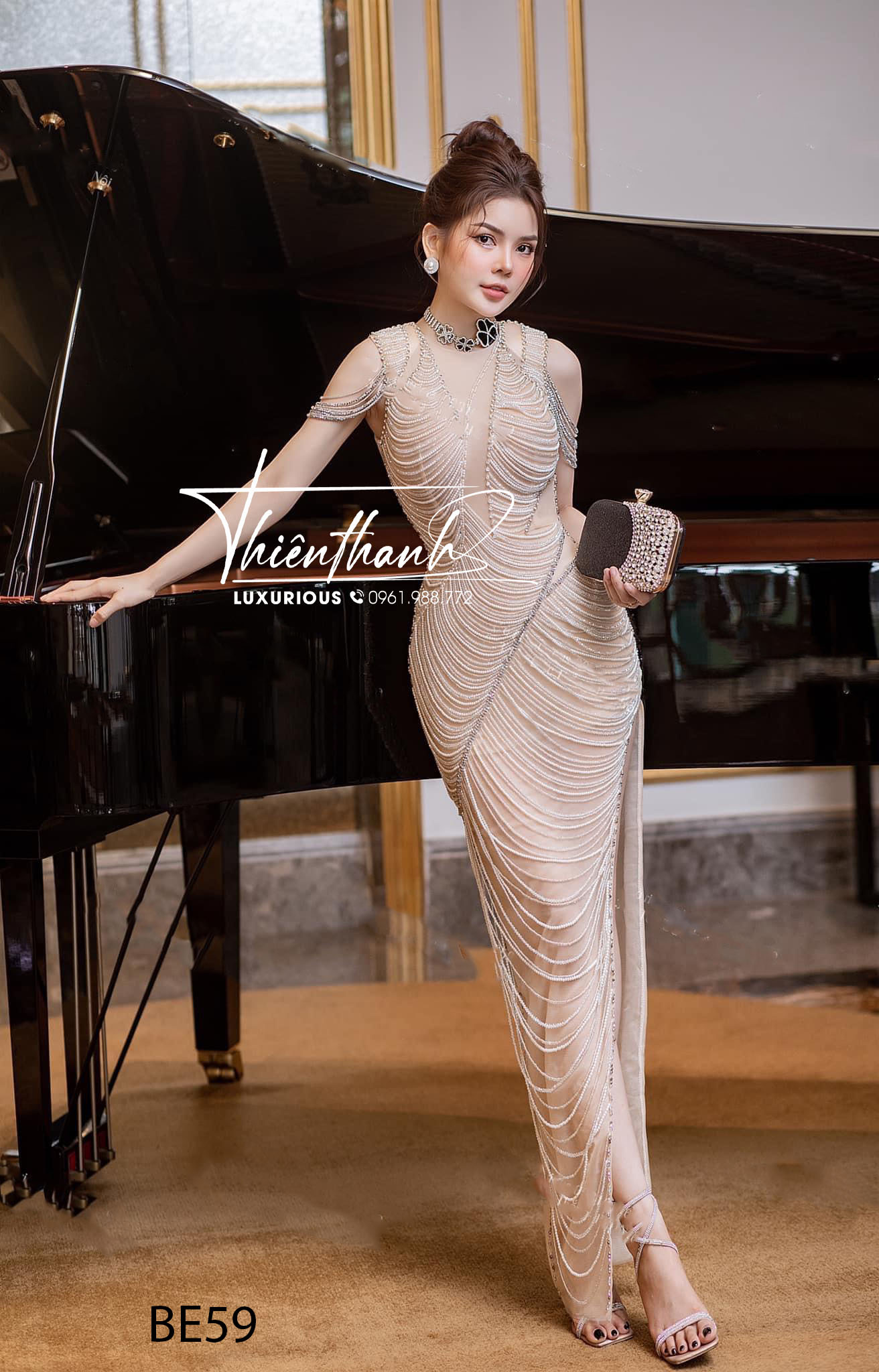Đầm TK Dài Đính Kết Xẻ Tà Vai Rơi