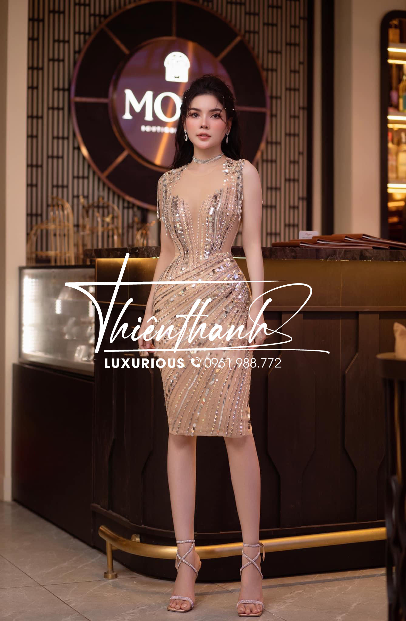 Đầm TK Body Đính Đá Cườm Phối Tay Rua Tua