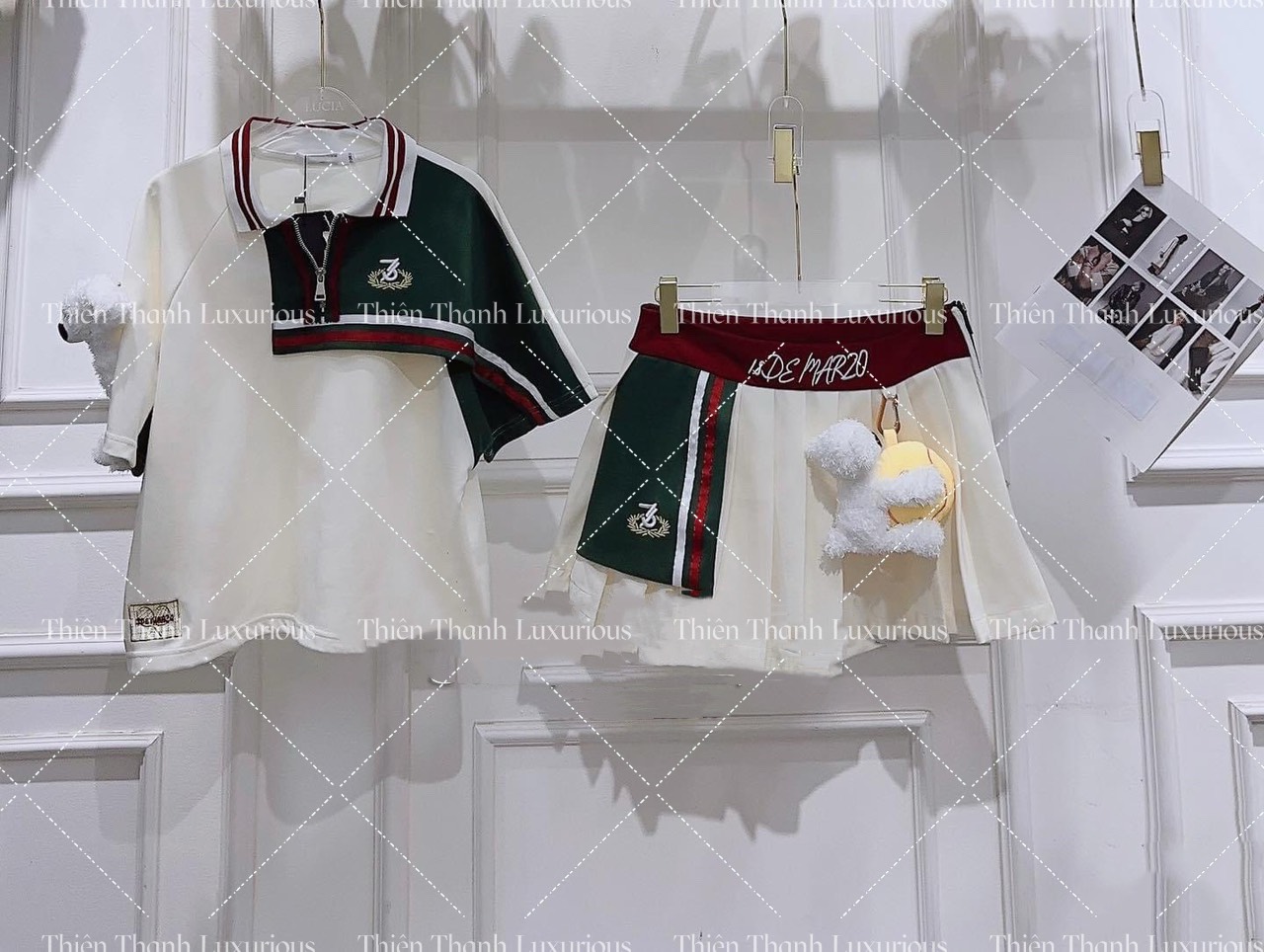 Set Áo Polo Phối Chân Váy Xếp Ly Đính Gấu Bông
