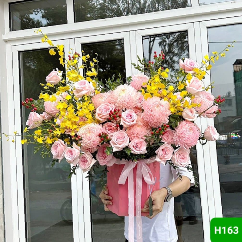 H163