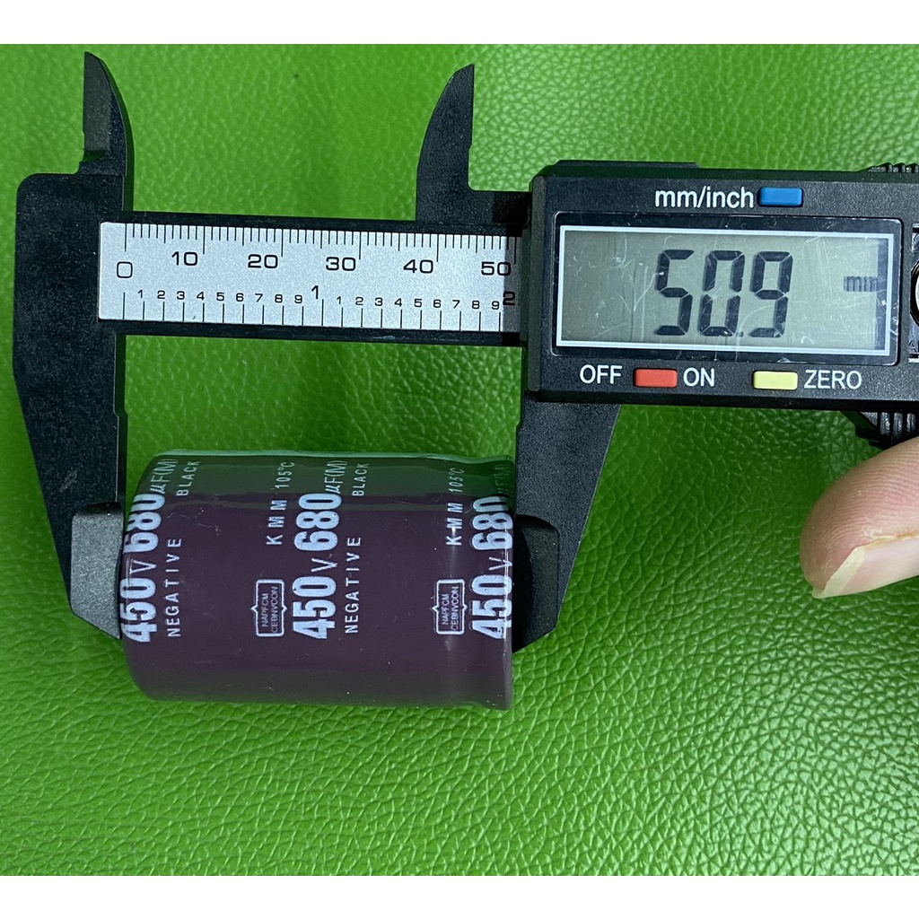Tụ lộc nguồn 680uF 450V DC (35x50mm)-giao ngẫu nhiên màu Đen hoặc màu Nâu