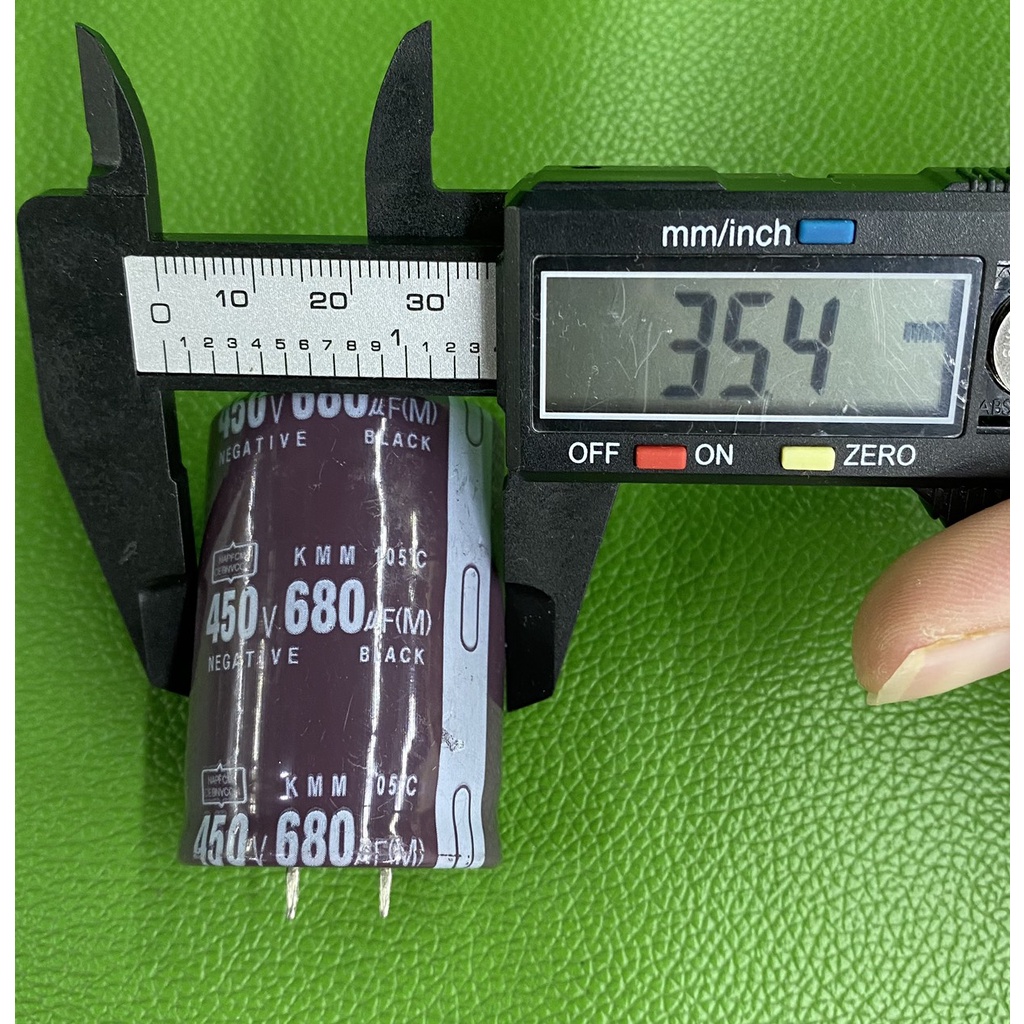 Tụ lộc nguồn 680uF 450V DC (35x50mm)-giao ngẫu nhiên màu Đen hoặc màu Nâu