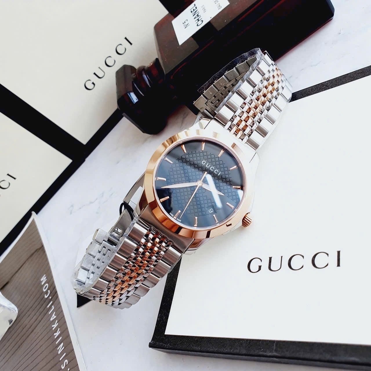 Đồng Hồ Gucci G-Timeless |Nam Giới |Mặt Đen |Dây Kim Loại Demi Rose |Máy Pin (Quartz) |Size 38mm |donghogiatot.vn