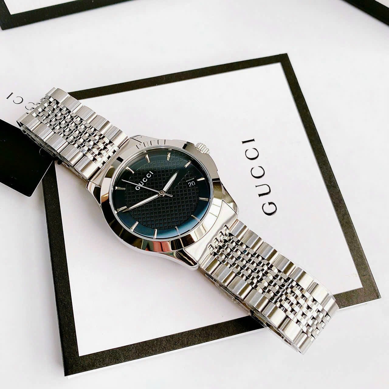 Đồng Hồ Gucci G-Timeless |Nam Giới |Mặt Tròn Đen |Dây Kim Loại Silver |Máy Pin (Quartz) |Size 38mm |donghogiatot.vn