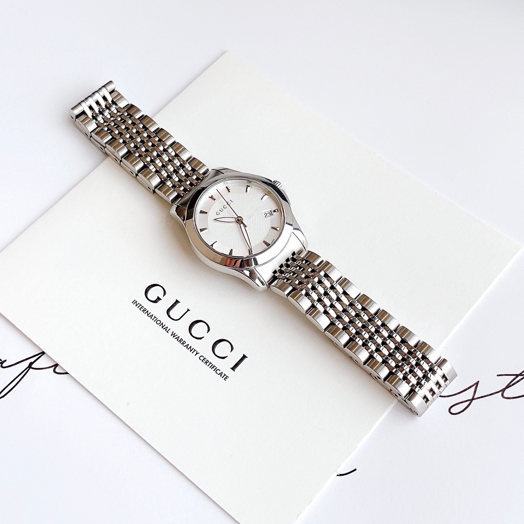 Đồng Hồ Gucci G-Timeless |Nữ Giới |Mặt Màu Trắng |Dây Kim Loại Silver |Máy Pin (Quartz) |Size 28mm |donghogiatot.vn