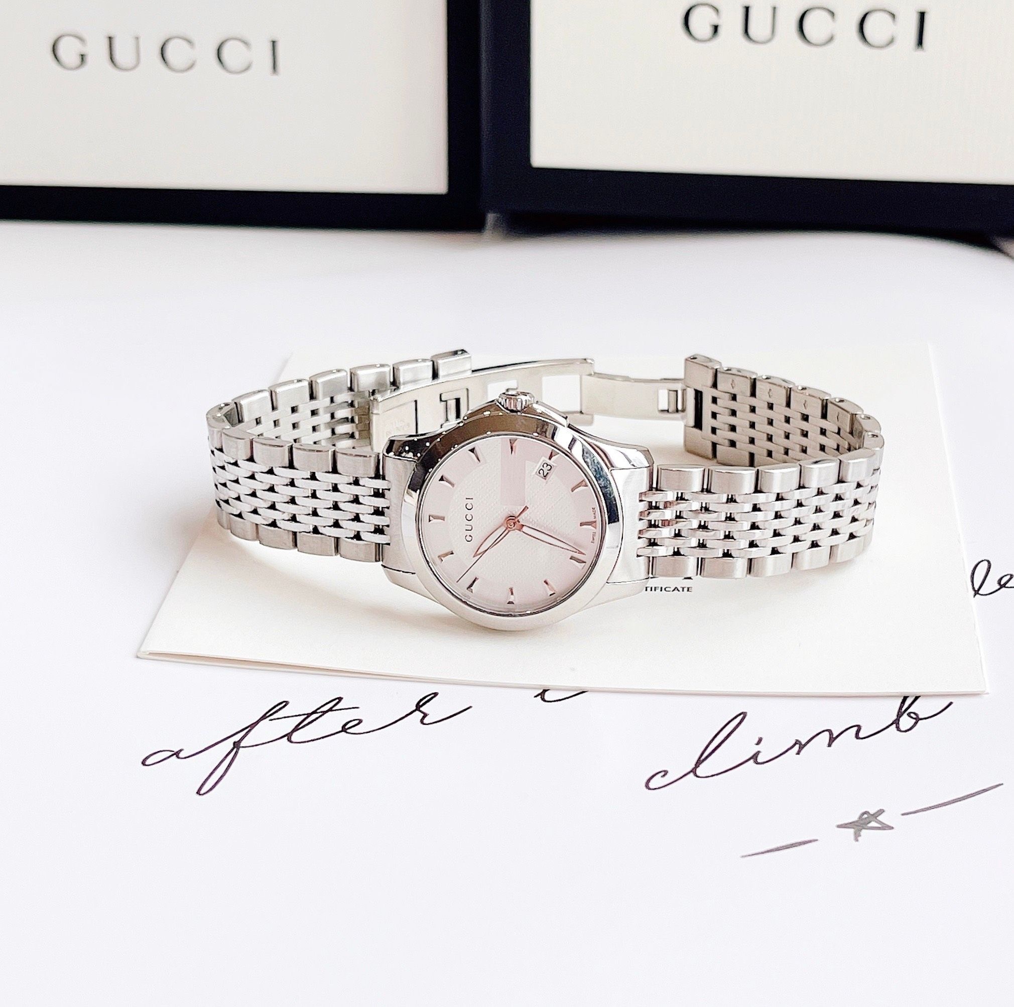 Đồng Hồ Gucci G-Timeless |Nữ Giới |Mặt Màu Trắng |Dây Kim Loại Silver |Máy Pin (Quartz) |Size 28mm |donghogiatot.vn
