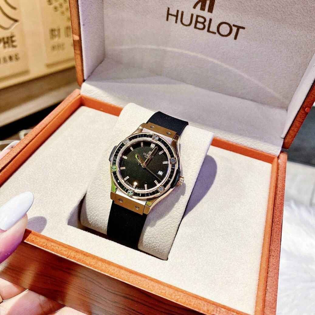 Đồng Hồ Hublot Geneve |Nữ Giới |Rose Gold |Đính Đá Đen |Dây Silicone |Máy Pin (Máy Quartz) |Size 34mm |donghogiatot.vn