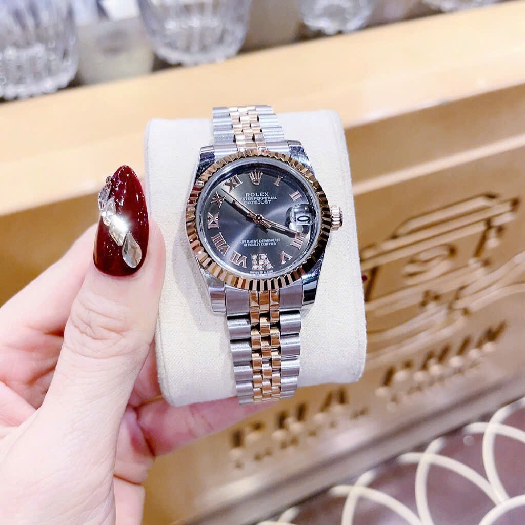 Đồng Hồ Rolex Mặt Số La Mã |Nữ Giới |Đen |Niềng Khía |Dây Kim Loại Demi |Máy Pin (Máy Quartz) |Size 31mm |donghogiatot.vn