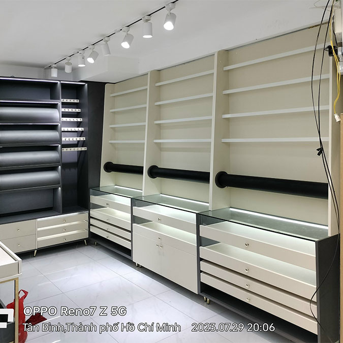 Thiết kế thi công nội thất cửa hàng thời trang chị Linh Gò Vấp, gỗ công nghiệp Hồng Nghi