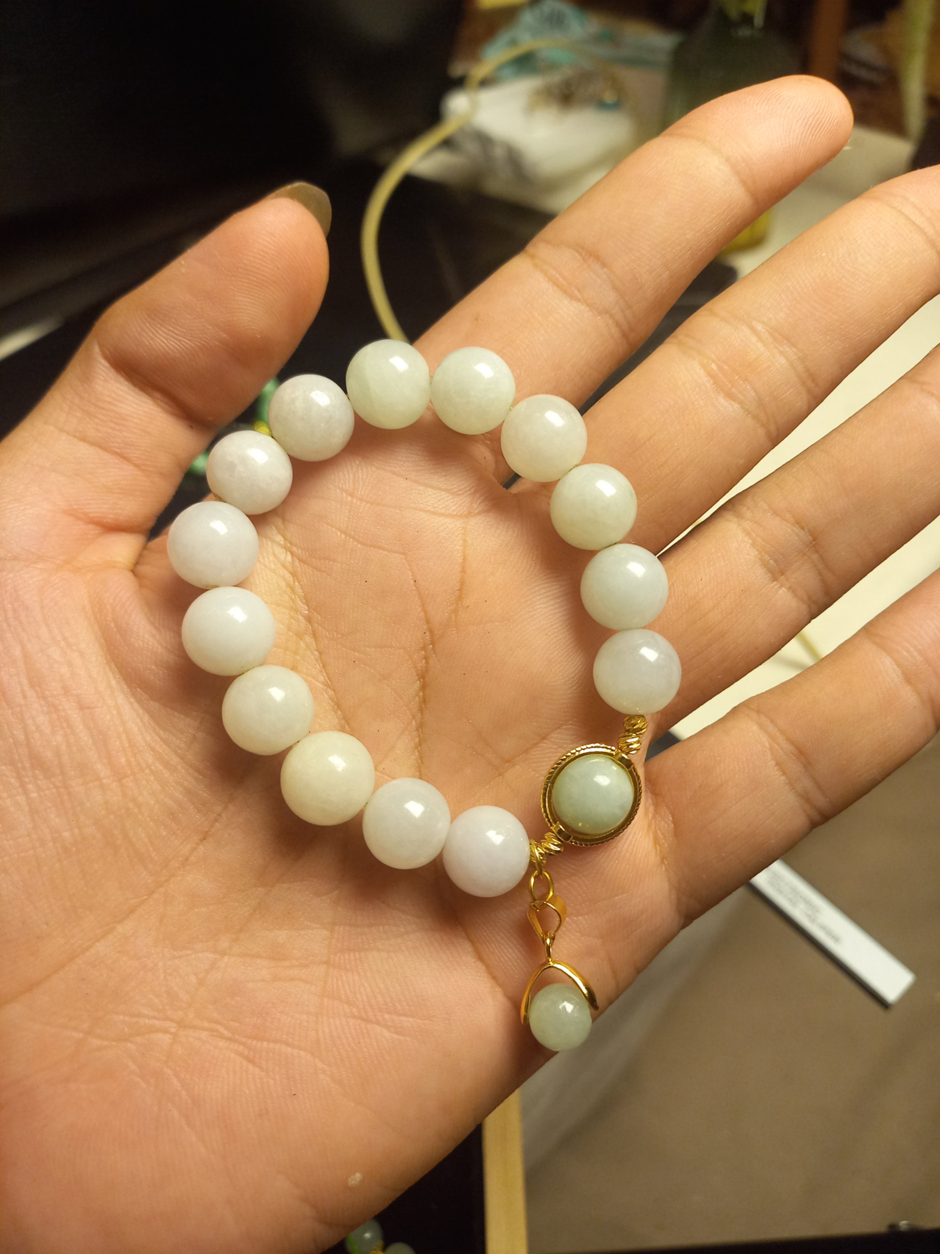 VÒNG TAY PHỈ THÚY BẠCH NGỌC HÓA KHỞI KEO 10.6 LY