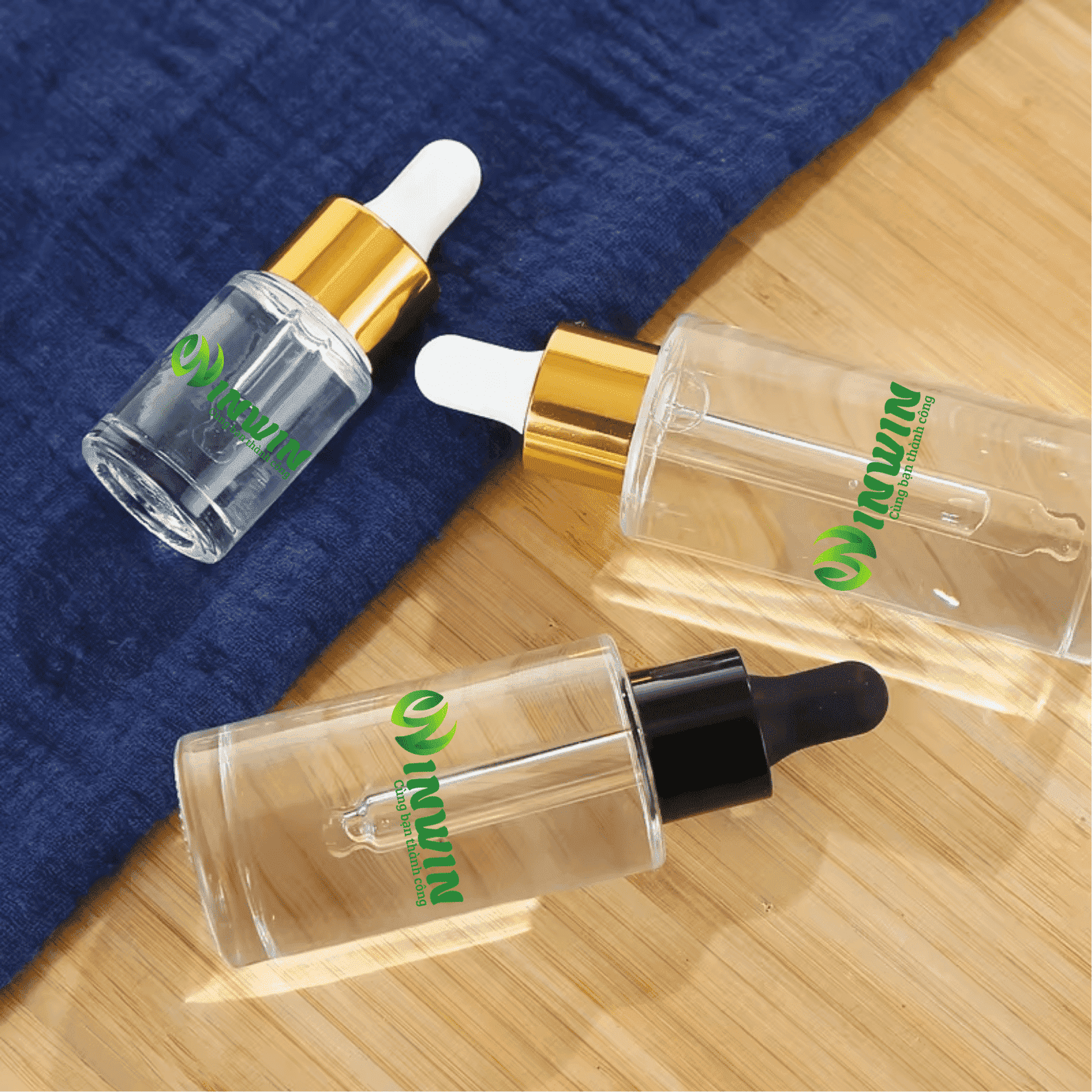 Chai thủy tinh vai phẳng màu trong 20ml - 250ml