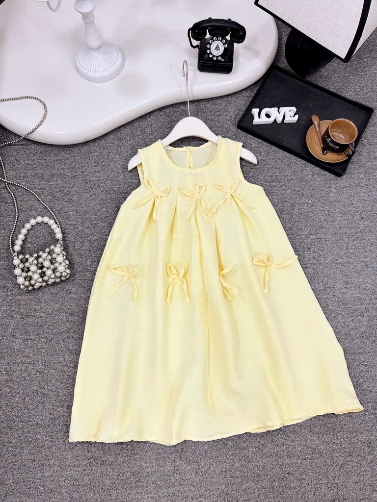 V392-Váy đũi babydoll nơ kèm túi (22.35kg)