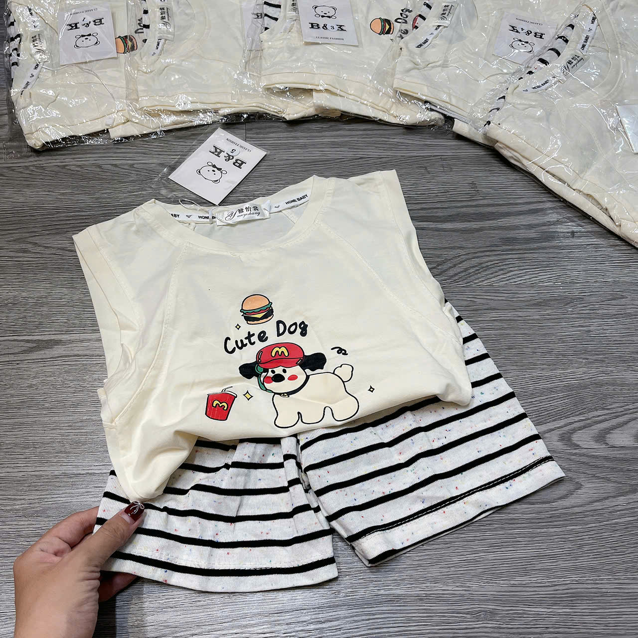 T699-Bộ SN kẻ cute dog kem (06.15kg)