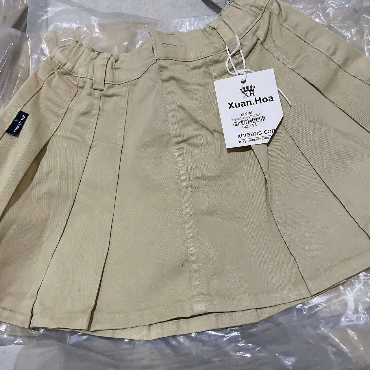 V432-Chân váy kaki xếp ly xoè (22.40kg)