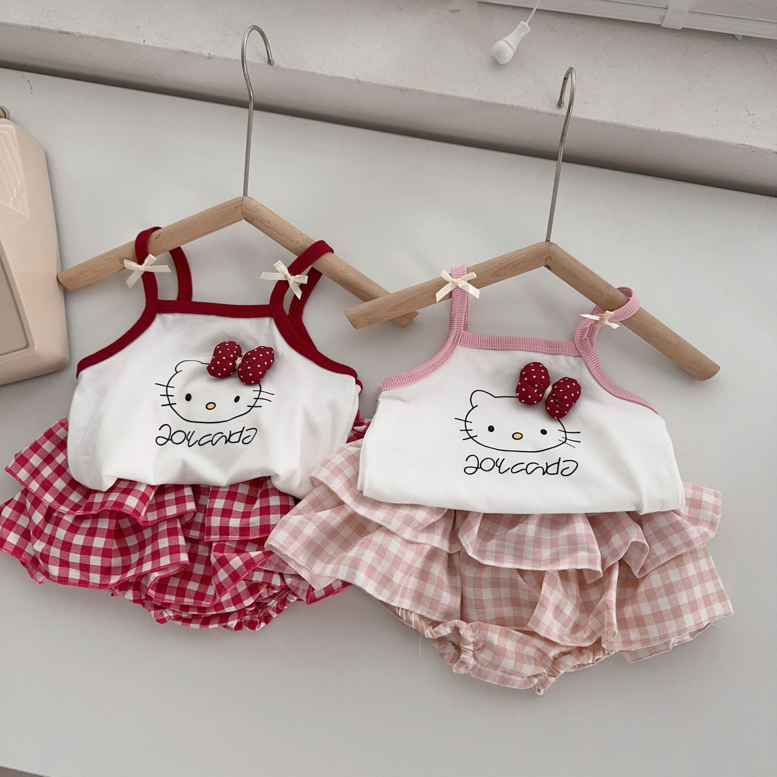 BD168-Set Kitty dây chip giả váy caro Đỏ (05.14kg)