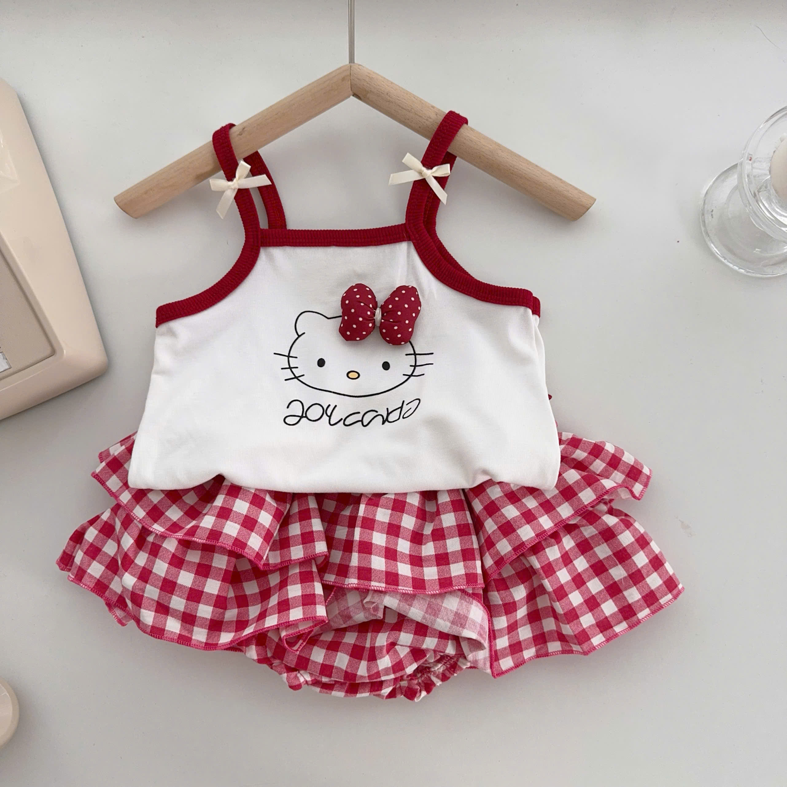 BD168-Set Kitty dây chip giả váy caro Đỏ (05.14kg)