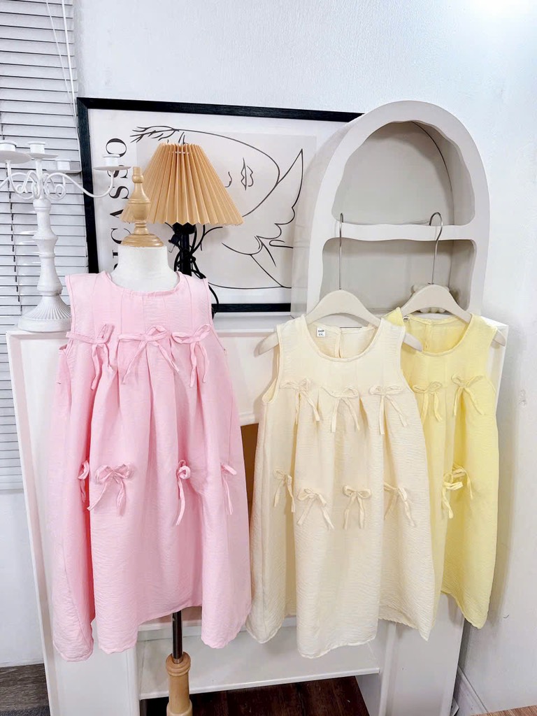 V392-Váy đũi babydoll nơ kèm túi (22.35kg)