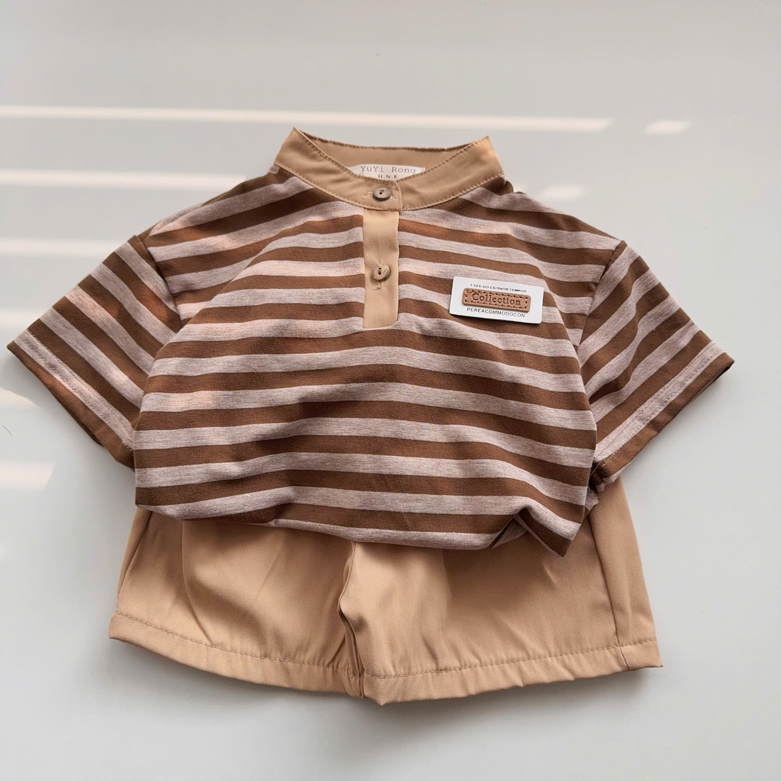 T552-Áo cổ trụ kẻ nơ quần 2da (08.17kg)