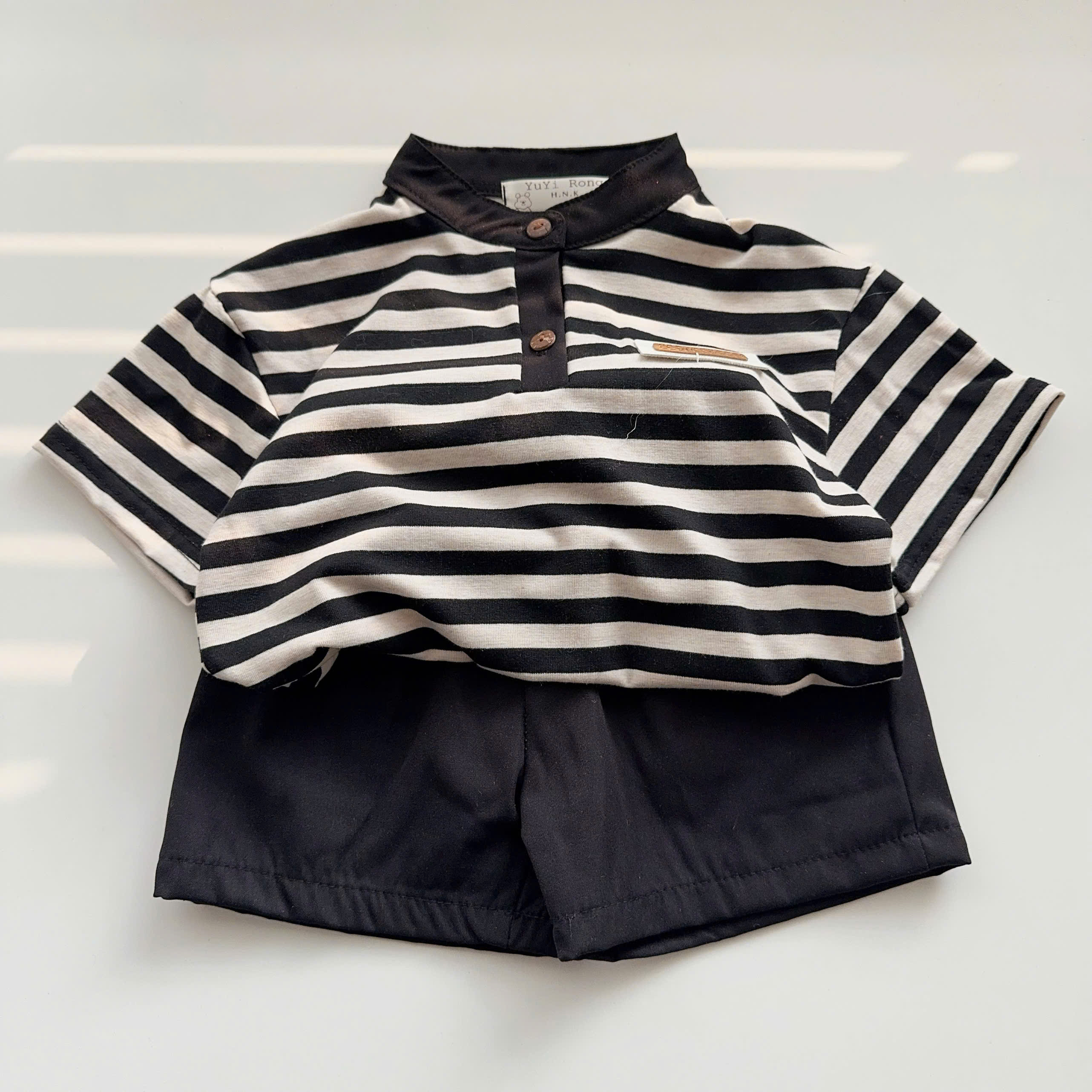 T552-Áo cổ trụ kẻ nơ quần 2da (08.17kg)