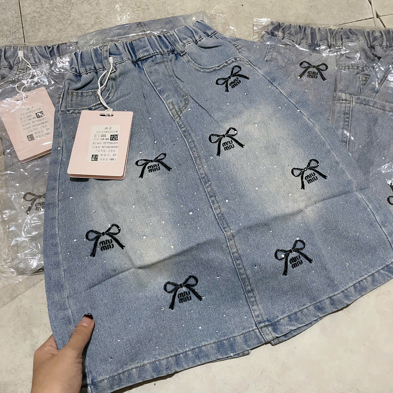 V322-Chân váy jean nơ đá Đại (22.38kg)