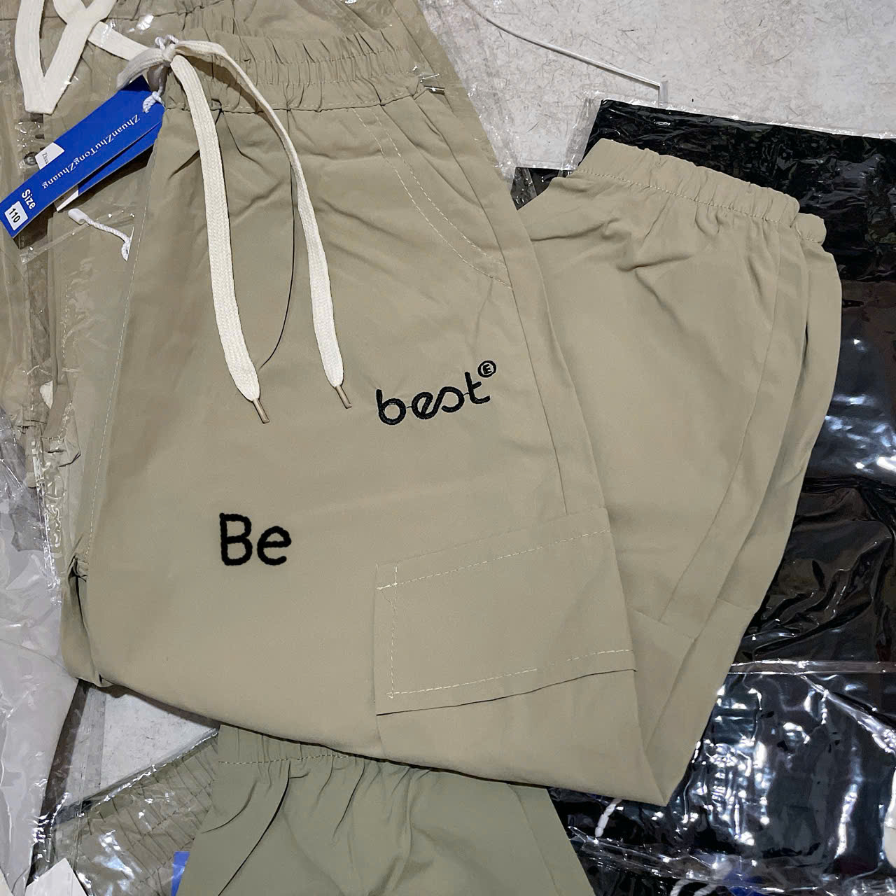 Q292-Quần gió kaki dài bom (22.40kg)