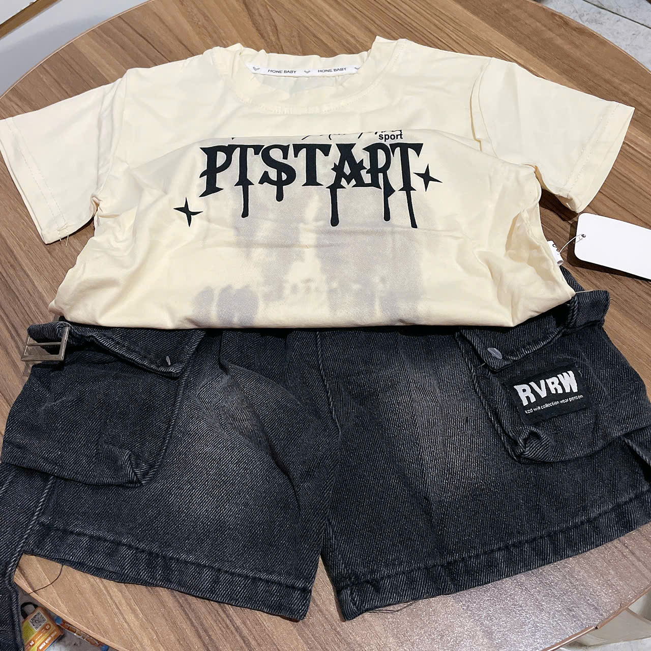 T585-Set áo thun chữ PTS q jean lửng (15.25kg)