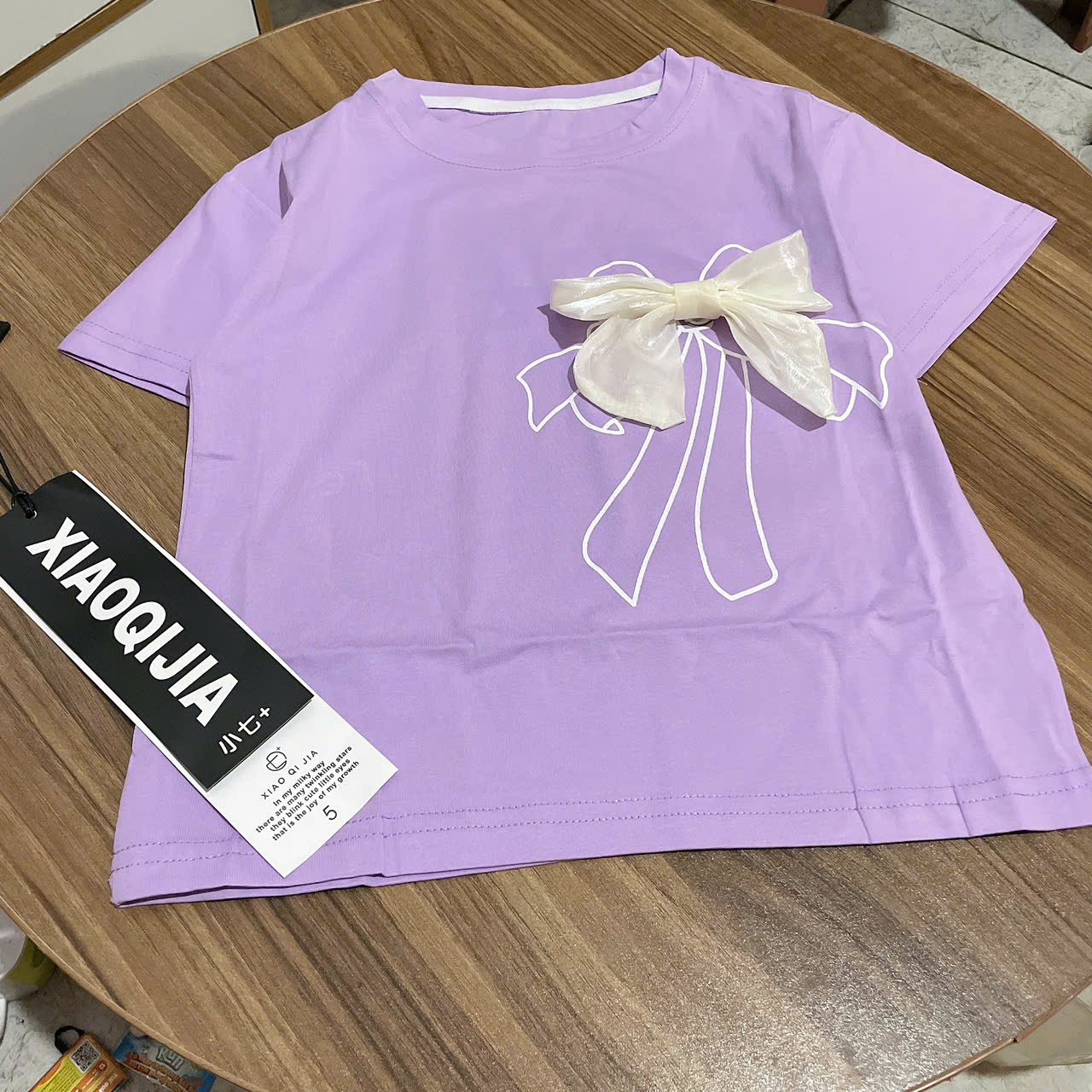 A369-Áo thun tím kèm nơ kem (17.33kg)