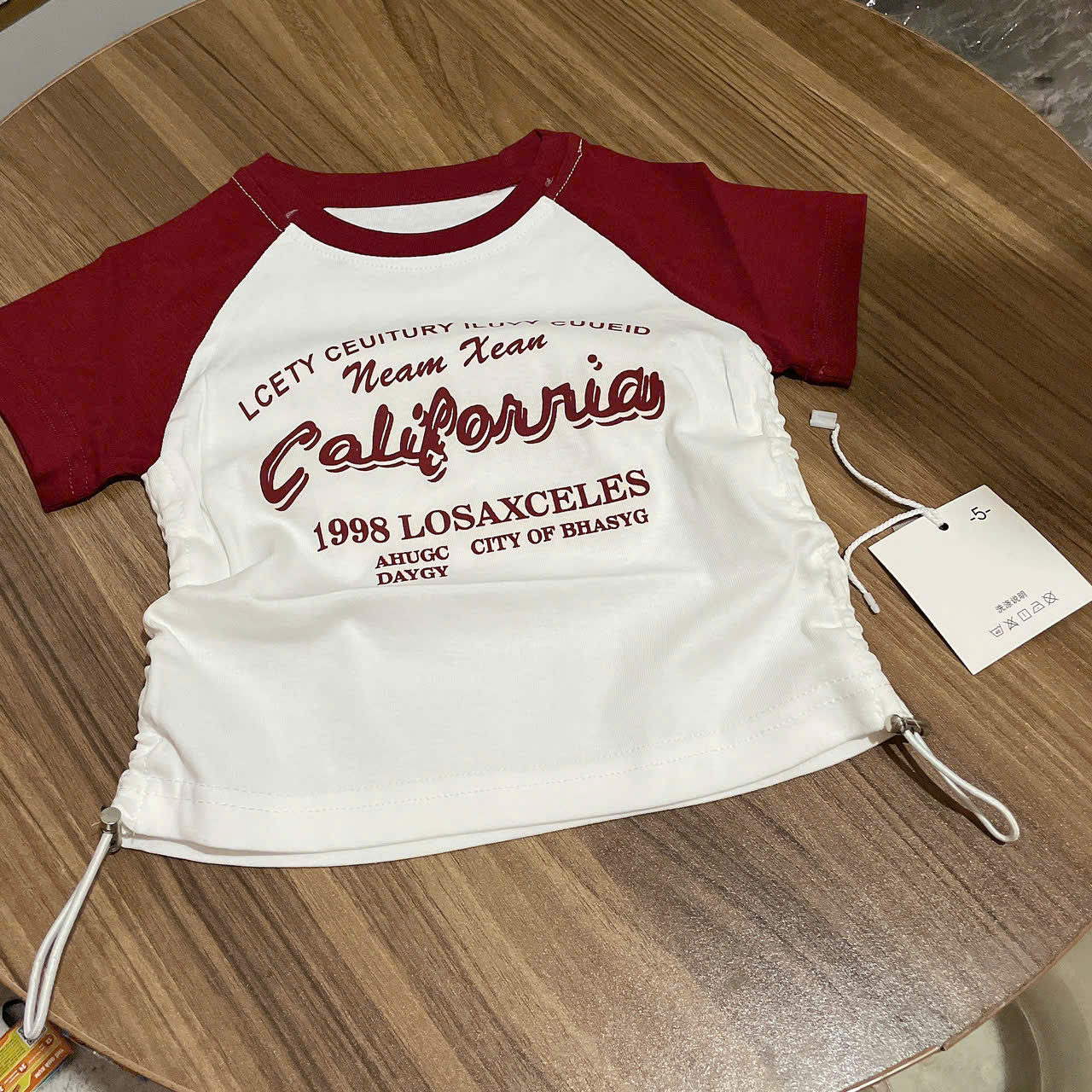 A371-Áo zip phối đỏ California (08.20kg)