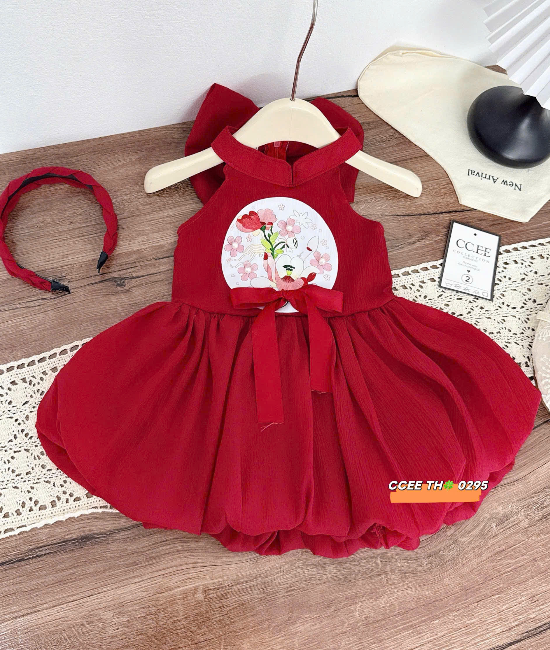 V358-Váy bí phồng cổ yếm kèm nơ cài (08.26kg)