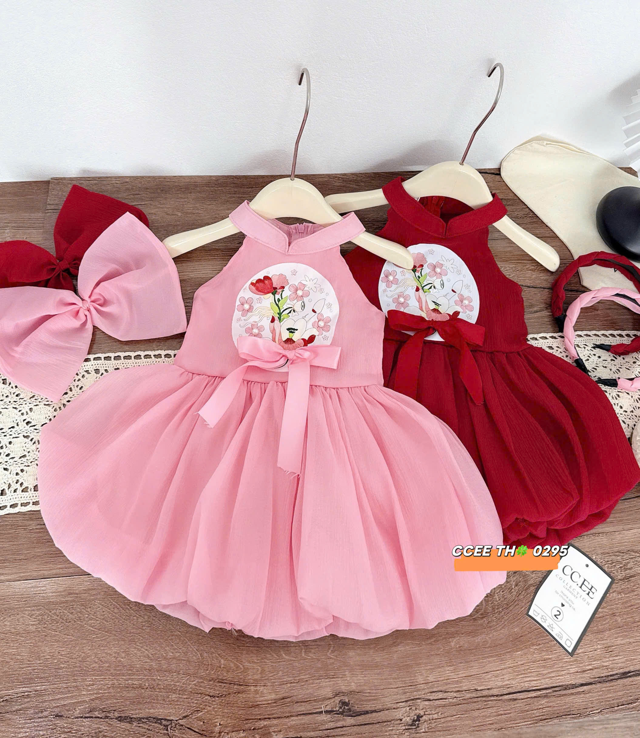 V358-Váy bí phồng cổ yếm kèm nơ cài (08.26kg)