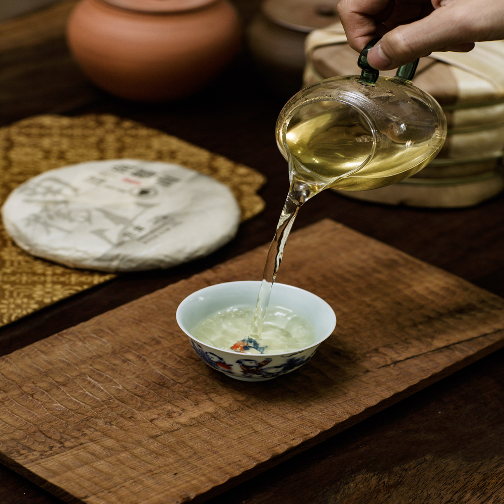 Phổ nhĩ sống Nam Nho Sơn bánh 200g 2023