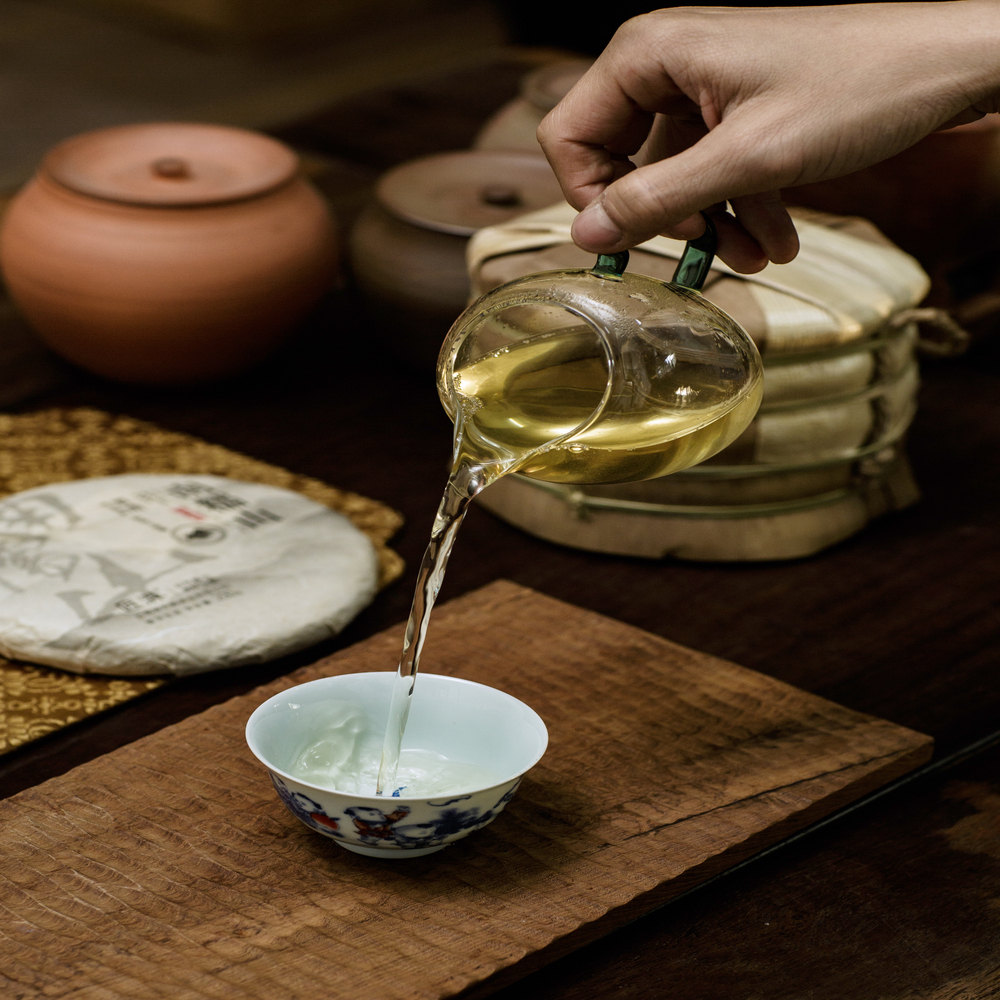 Phổ nhĩ sống Nam Nho Sơn bánh 200g 2023