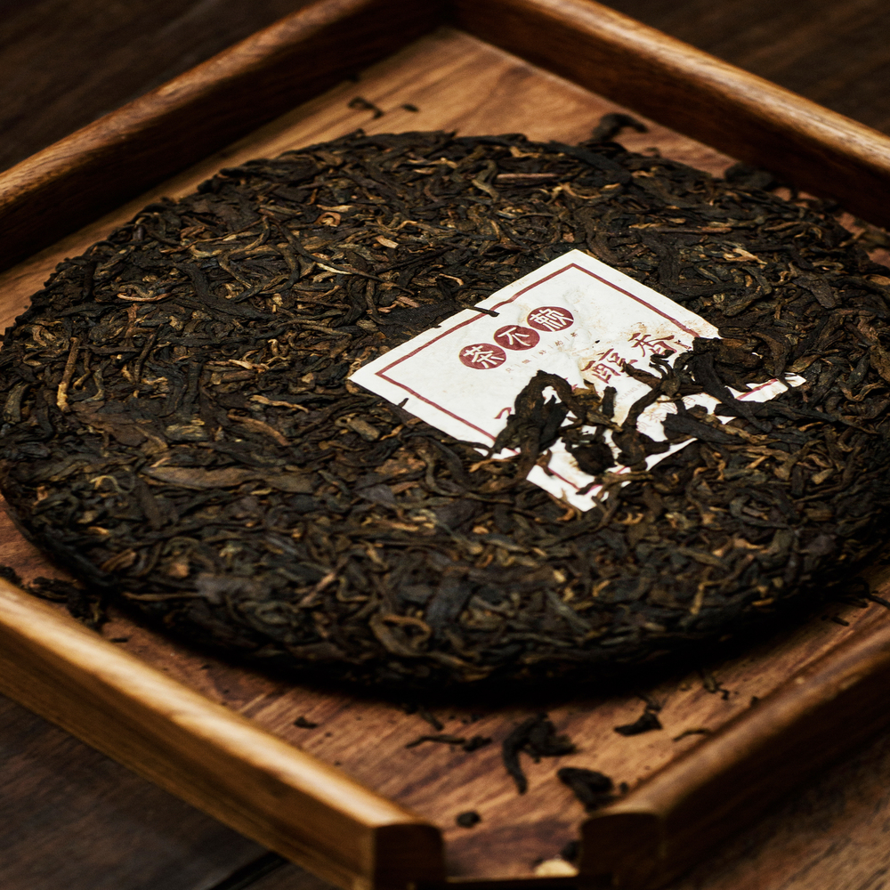 Phổ nhĩ chín Mãnh khố Thuần Hương bánh 300g 2018