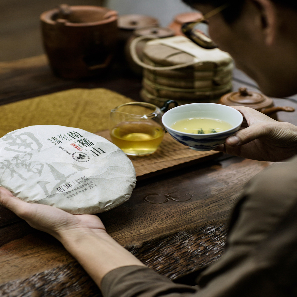 Phổ nhĩ sống Nam Nho Sơn bánh 357g 2023