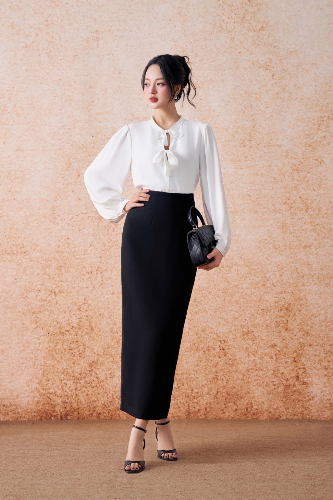 SM157LA - Sơ mi cổ tròn 2 nơ ngực