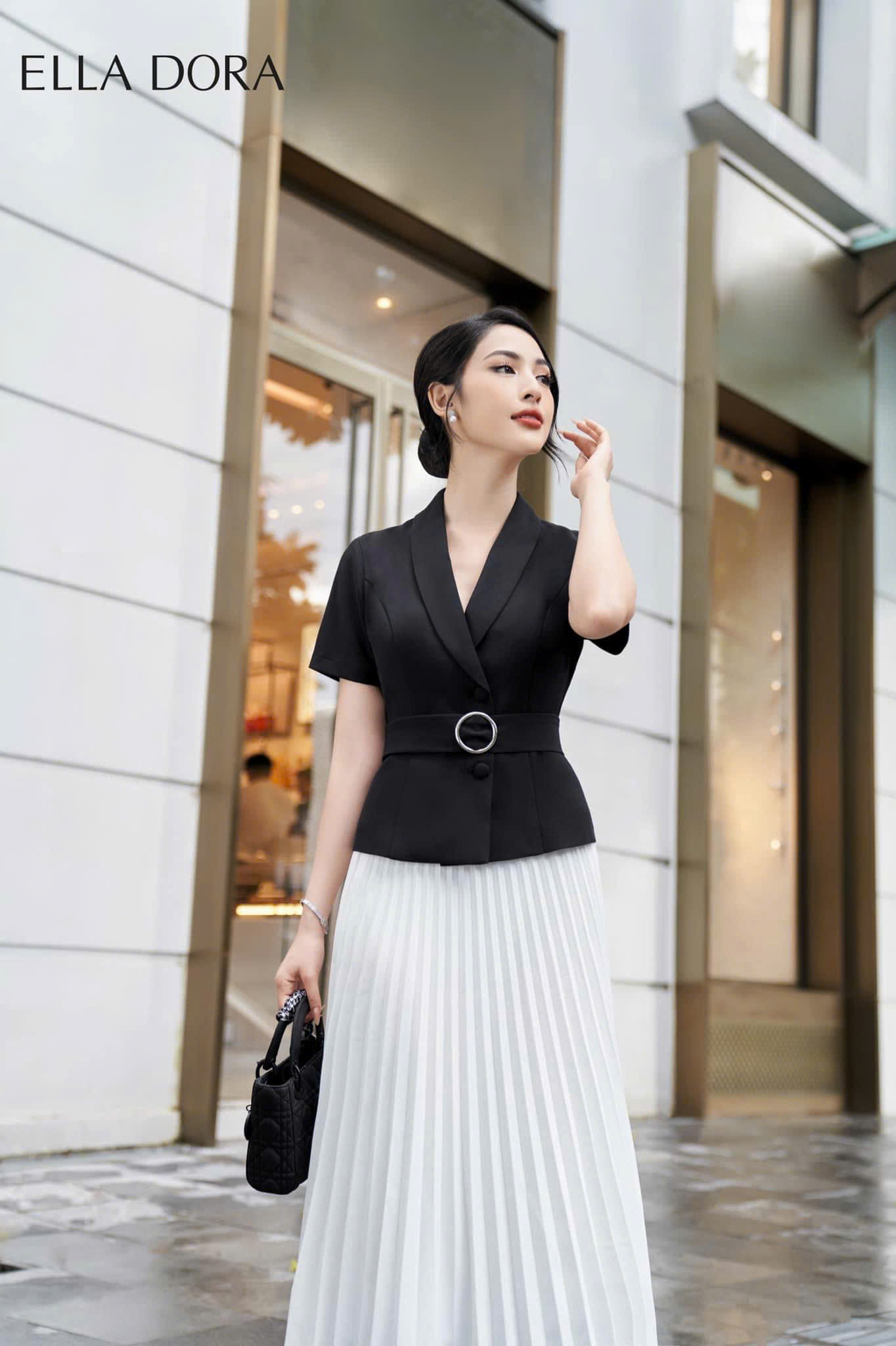 Chân váy dập li quạt trắng