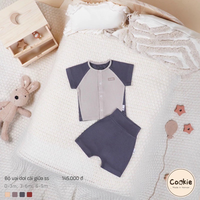 (0M-9M) Bộ cộc tay vai dời cài giữa cotton tăm lạnh Cookie