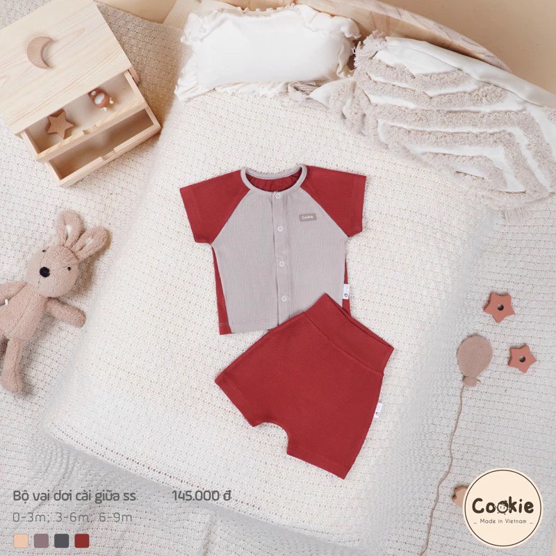 (0M-9M) Bộ cộc tay vai dời cài giữa cotton tăm lạnh Cookie