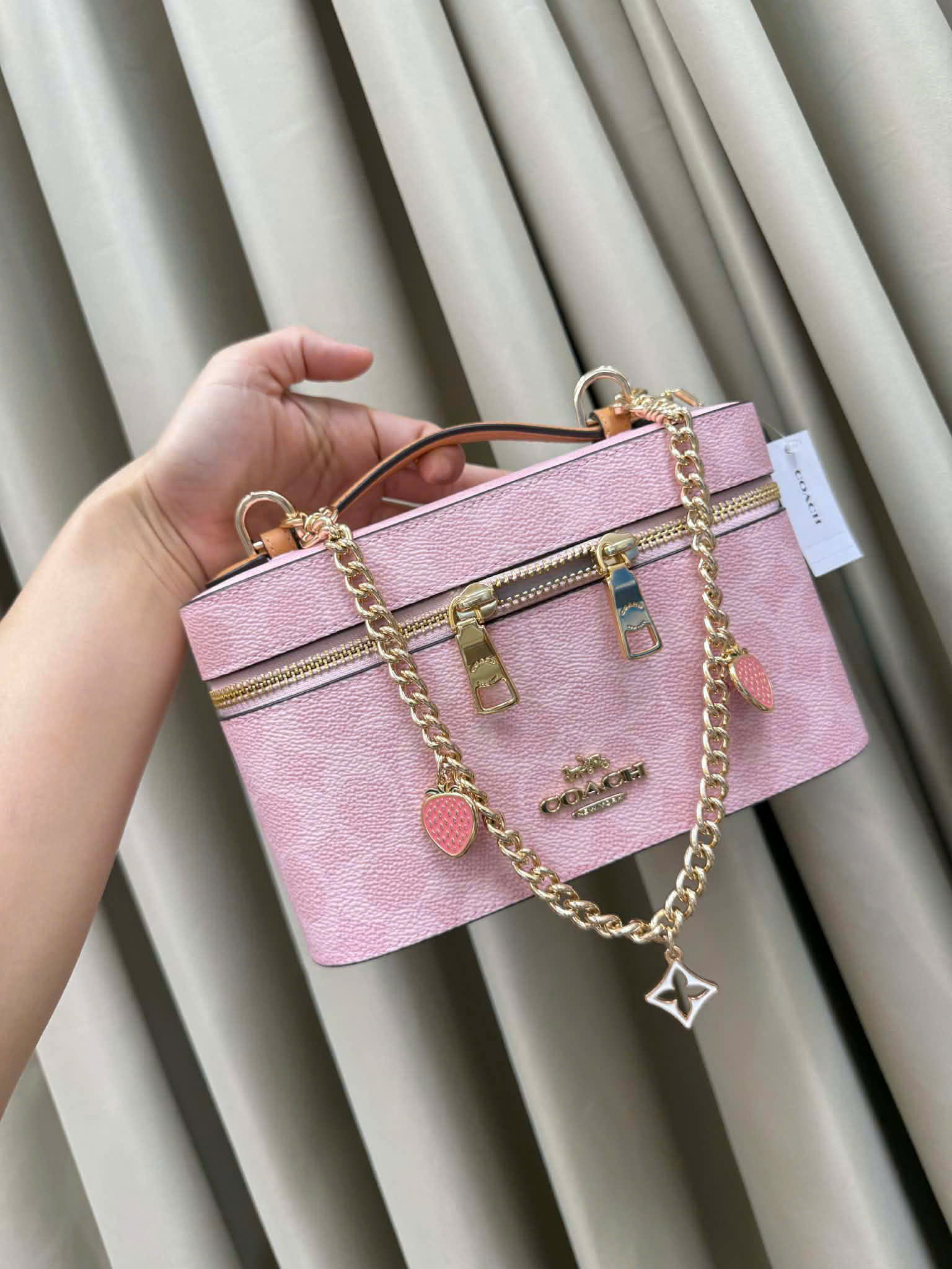 Túi Vanity Coach Hồng Sakura