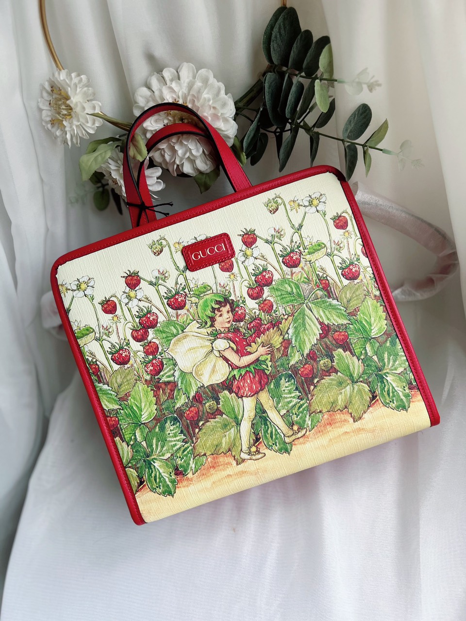 Túi Gucci tote kid