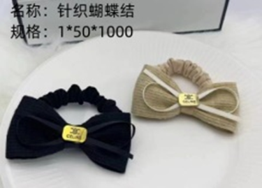 Dây buộc tóc thắt nơ trái tim thêu.