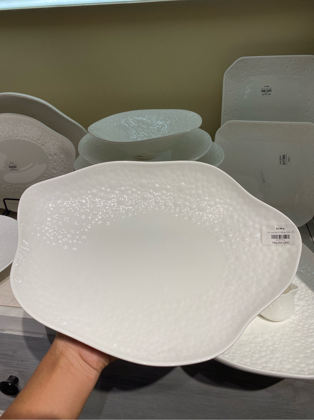 Đĩa oval sâu 12 trắng chấm nổi